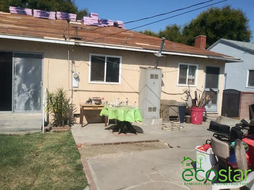 Shingle bundles on a house roof during a reroof by EcoStar Remodeling & Construction