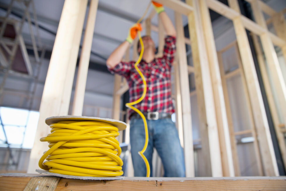 Close-up of electrical wiring during construction